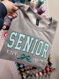 Senior EST Coquette Varsity Shirt | Embroidered Glitter HTV Appliqué Graduation Tee, Sweatshirt & Hoodie